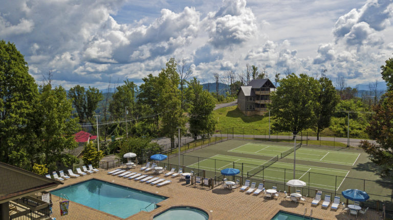 North Clubhouse, one of three pool recreation areas available to you during the season.  Enjoy the pools, view, tennis, pickleball or ping pong entertainment offered there!