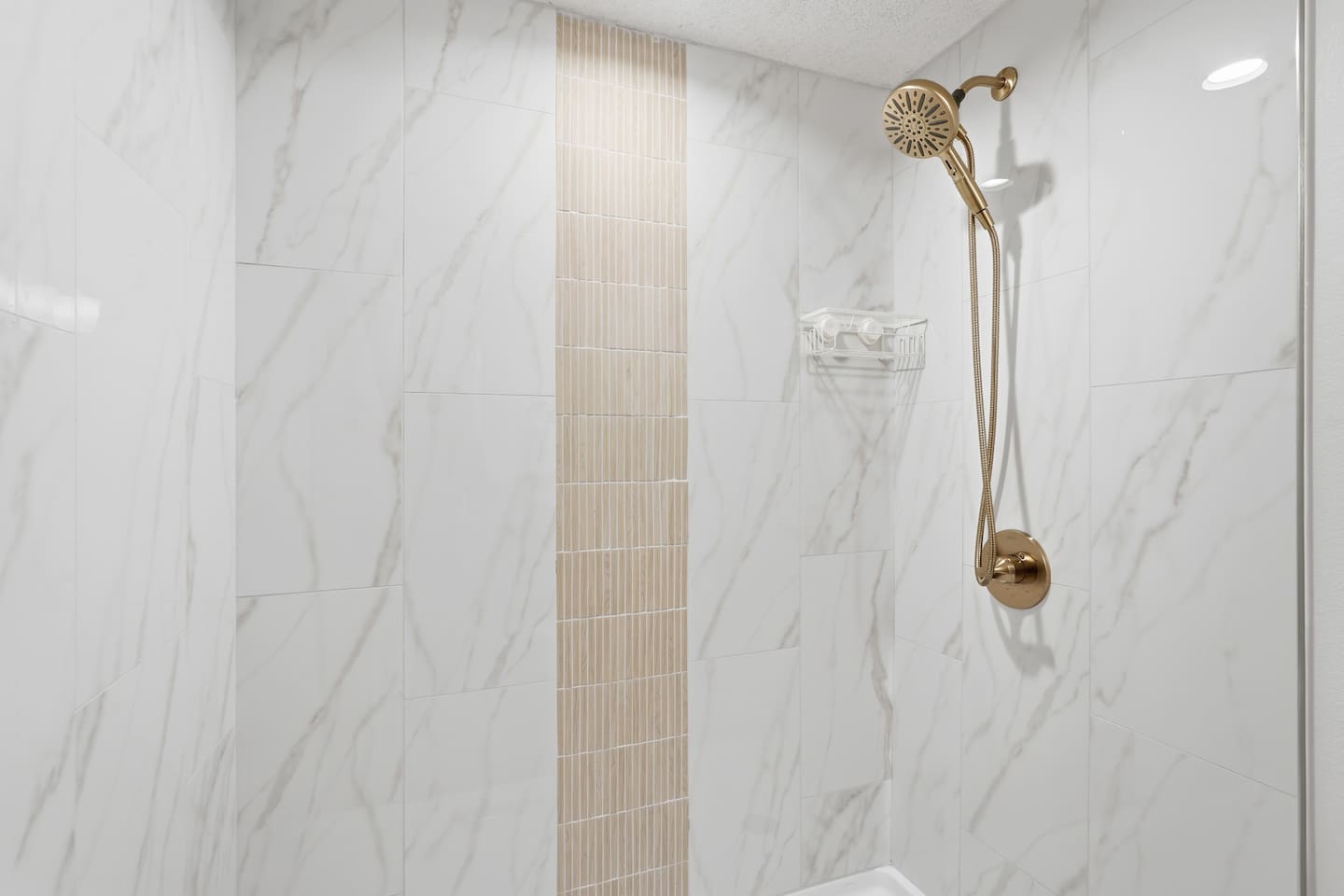 Primary ensuite bathroom has tiled walk-in shower with no step!