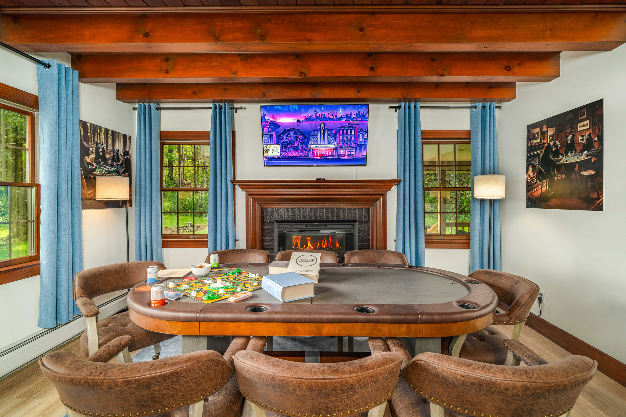 🔥 The poker room: full casino-style table, built-in electric fireplace and 55" HDTV. Game night has its own room here.