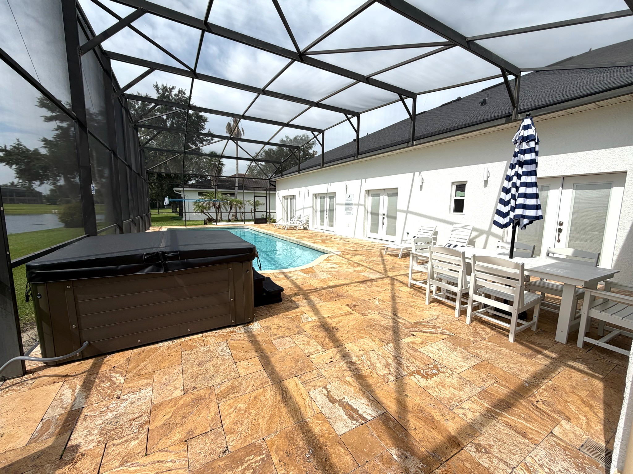 Large Stunning Pool with a real Hut Tub overlooking the lake
