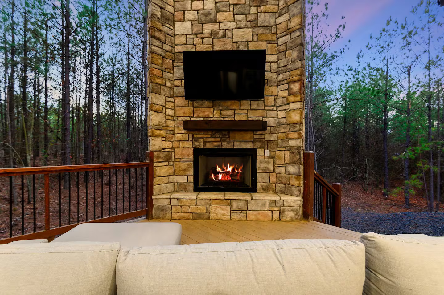 Gather around the glowing fireplace as night falls — laughter, stories, and the scent of pine filling the air.