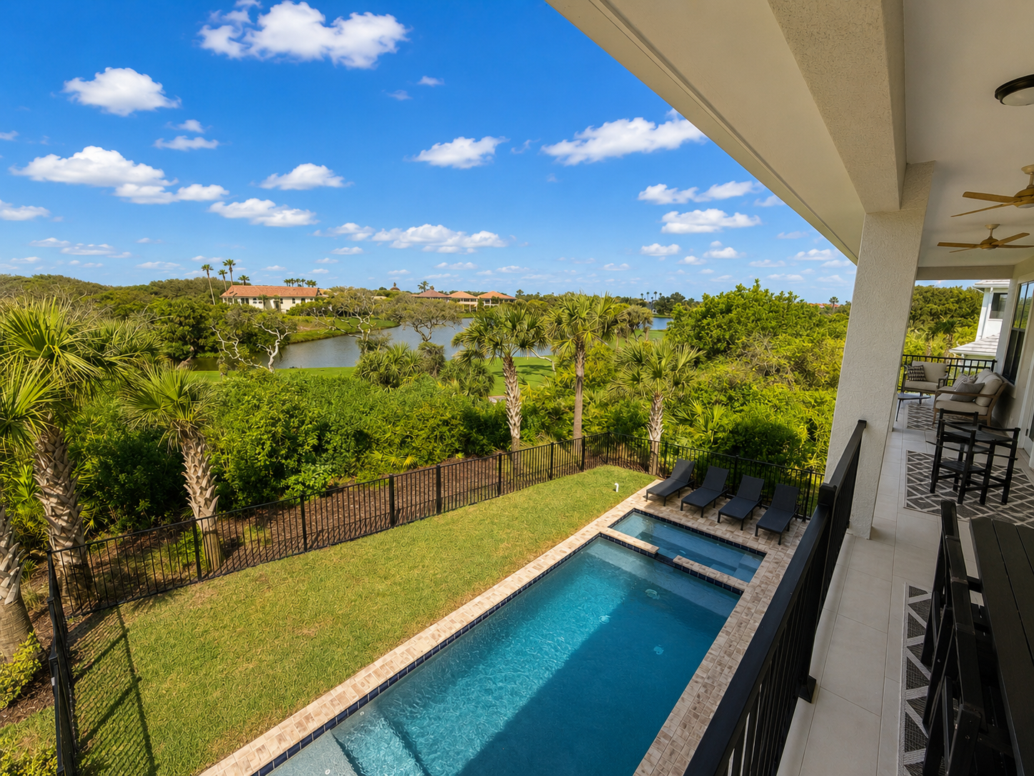 Morning coffee never tasted better than up here, overlooking your private pool with the golf course and lake stretching to the horizon. Wave to the early golfers, plan the day together, and drink in a view you'll be dreaming of long after you leave.