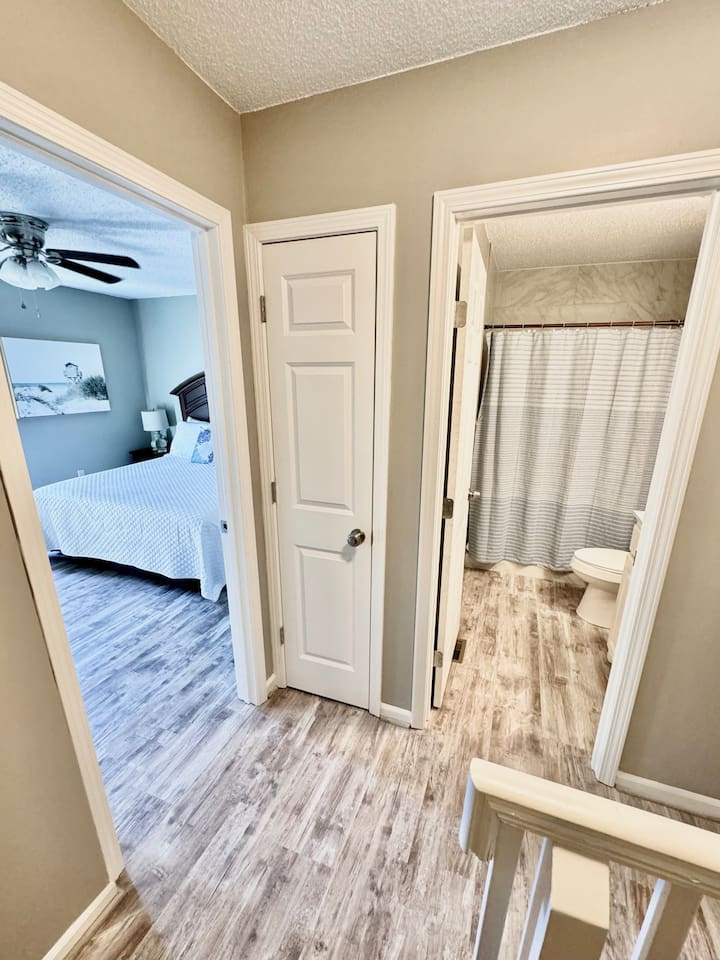 Spacious Bedroom Suite: Bright and airy with plush furnishings, just steps from the beach!