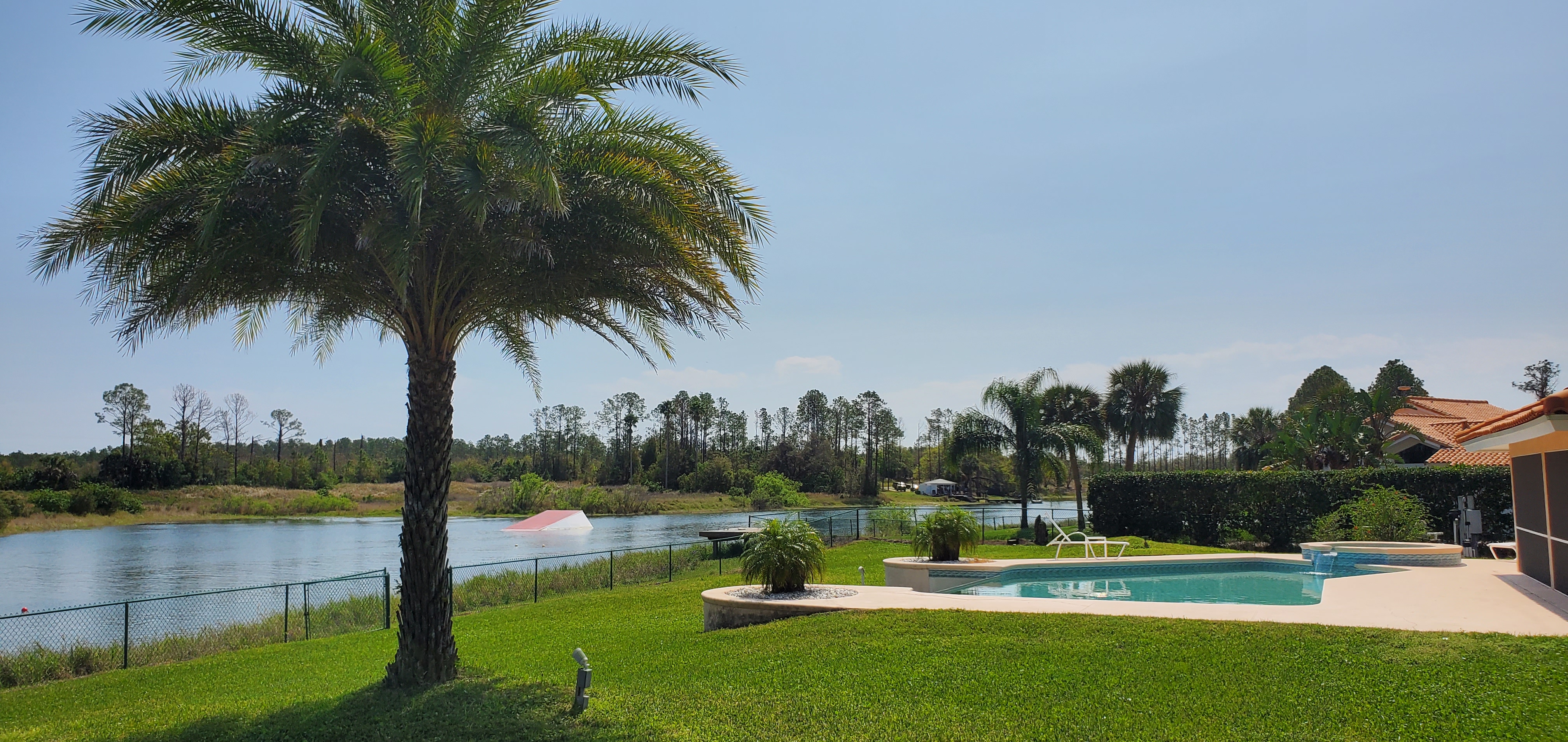 View of lake and ski jump from backyard