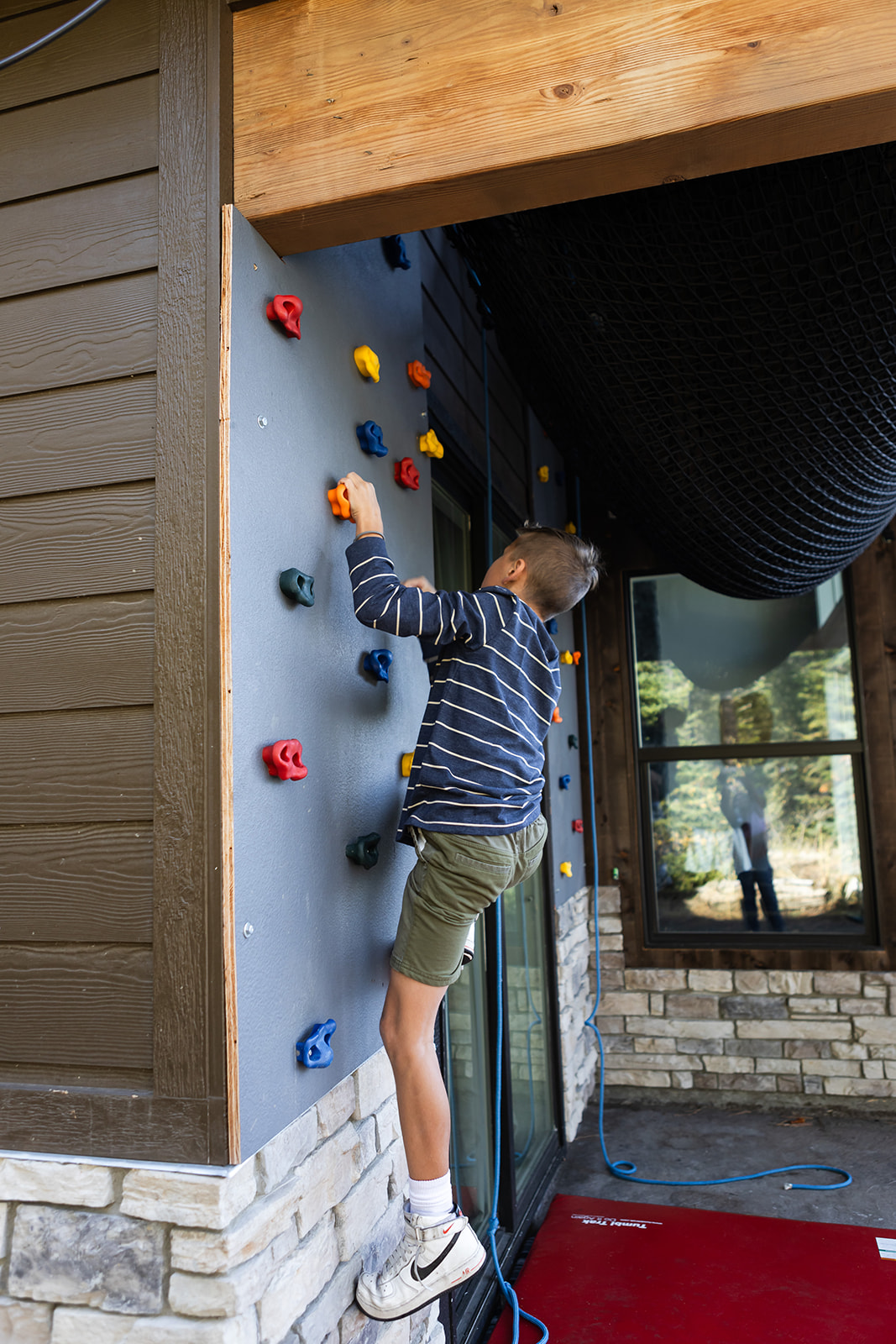 Challenge yourself on the fun outdoor climbing wall right by the house.