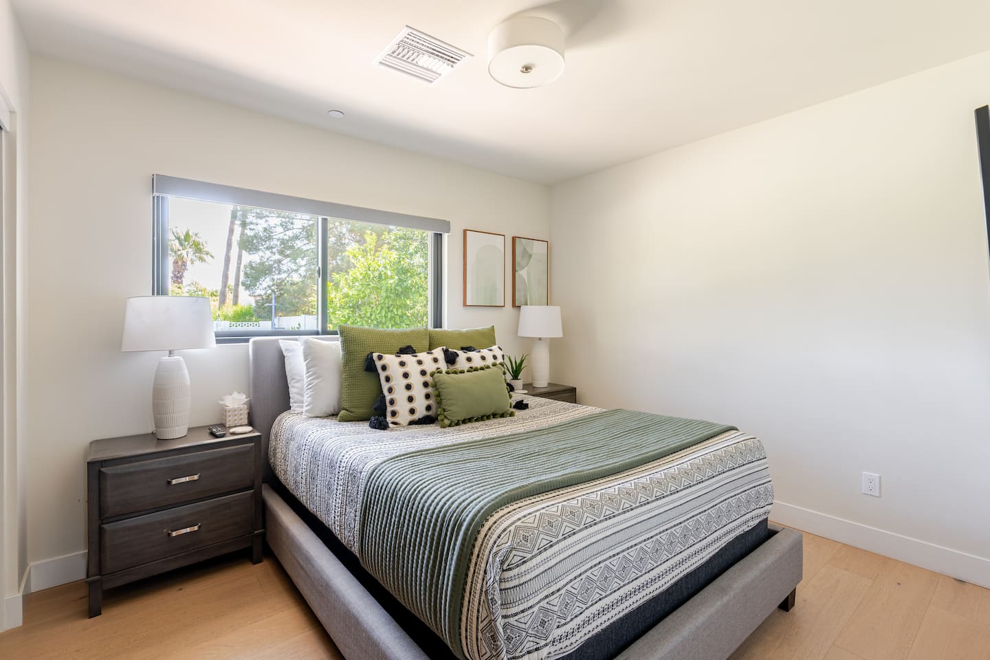 Chic and calming, this second bedroom offers the perfect blend of comfort and minimal design to help you unwind.