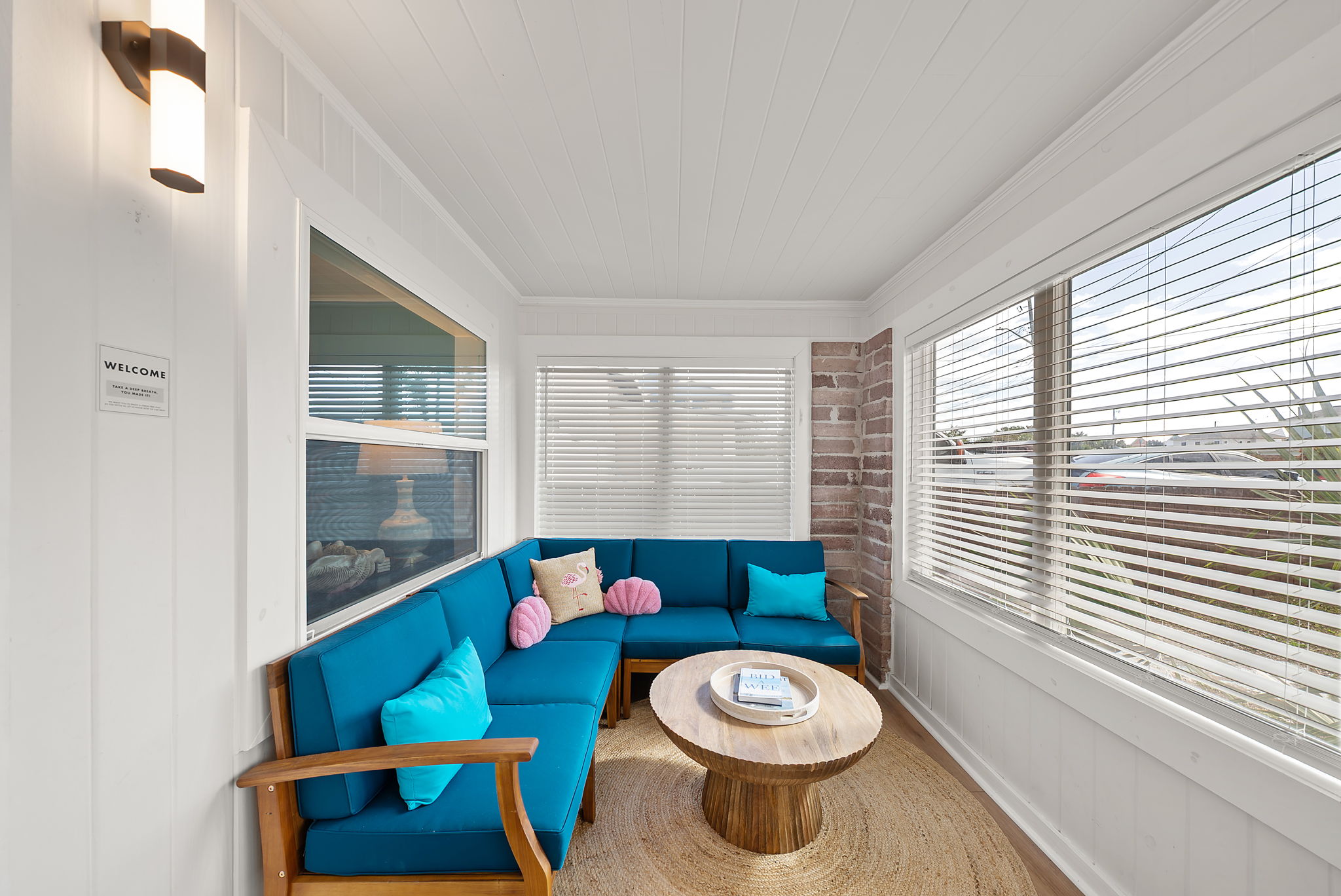 The sunroom seating area gives you a spot to decompress. Imagine sitting here with a book and a coffee in the morning, or a glass of wine in the evening while chatting with friends.