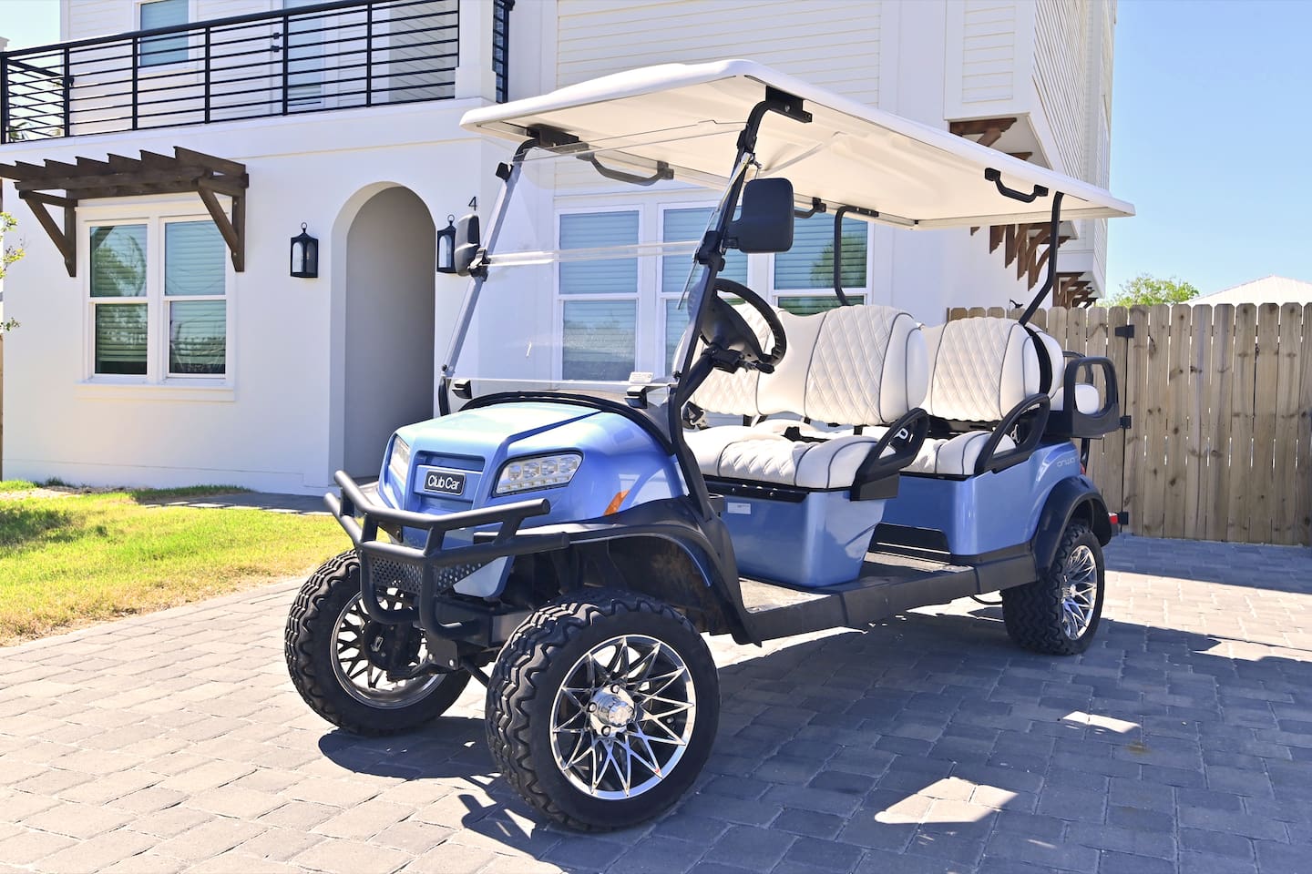 Complimentary six-seater, street-legal golf cart.

