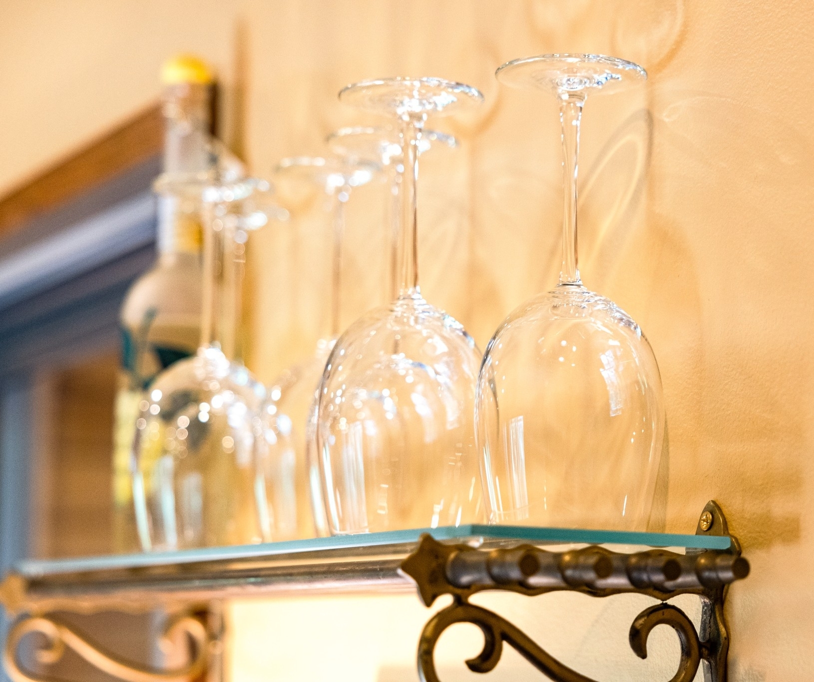 The Sunroom lounging area is well equipped with red and white wine glasses, ice bucket, bar tools, and more!