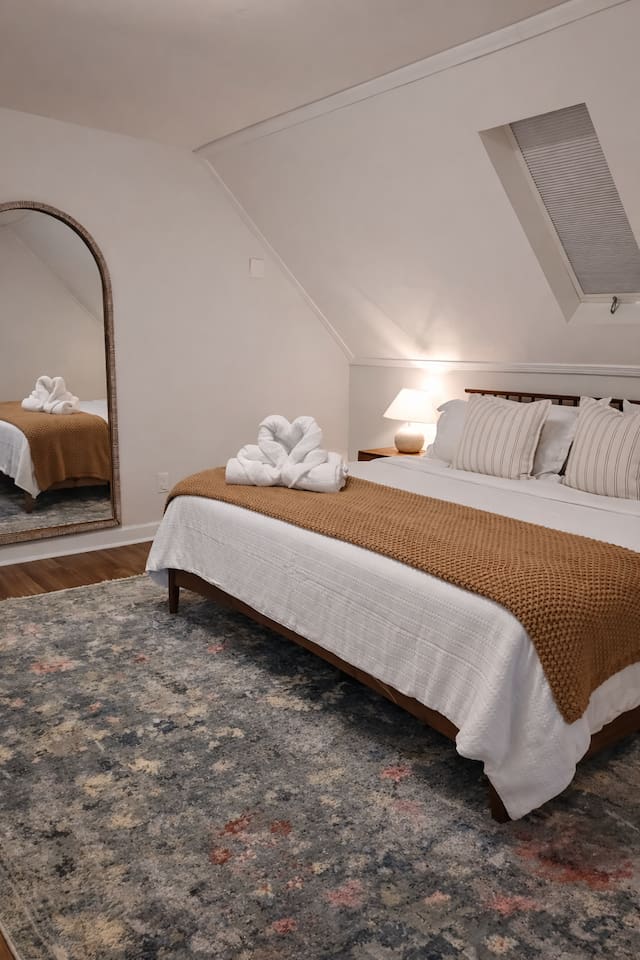 Comfortable bedroom with premium bedding designed for a restful night's sleep.