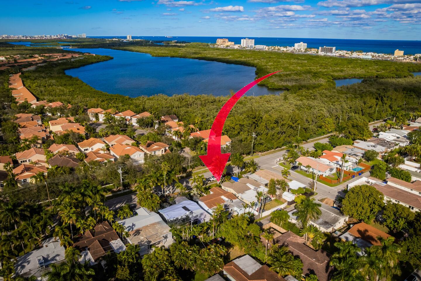 Just a 5 minute walk to Hollywood Beach Boardwalk is this lovely Bungalow tucked in a safe family-friendly neighborhood