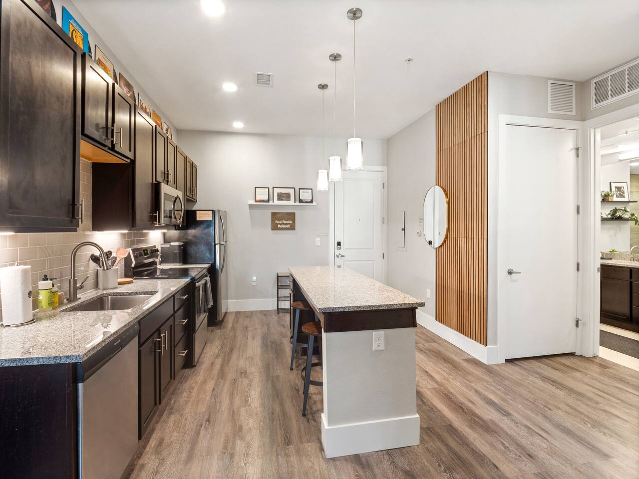 Spacious, open concept kitchen with everything you need for cooking! Keurig coffee maker. Pots, pans and baking dishes. Breakfast bar.