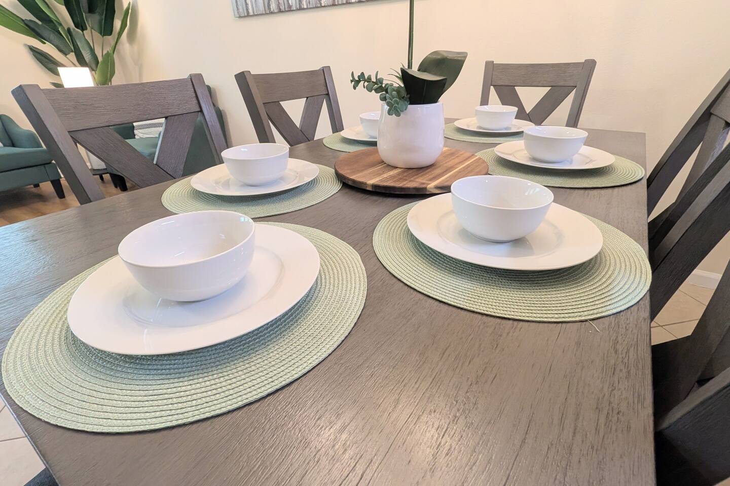 Ready to serve a family dinner with plates, cups, bowls, and silverware provided. Host even provides children's place settings. 