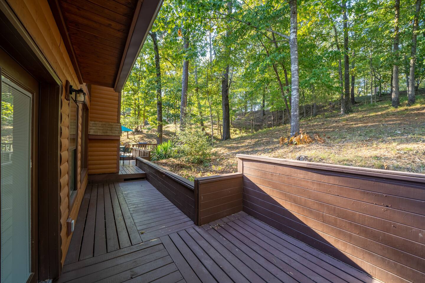 Lets have a look out that door. Lots of wildlife passes through here including deer, turkey, foxes, and beautiful birds. -Master bedroom access to back deck private patio area. 