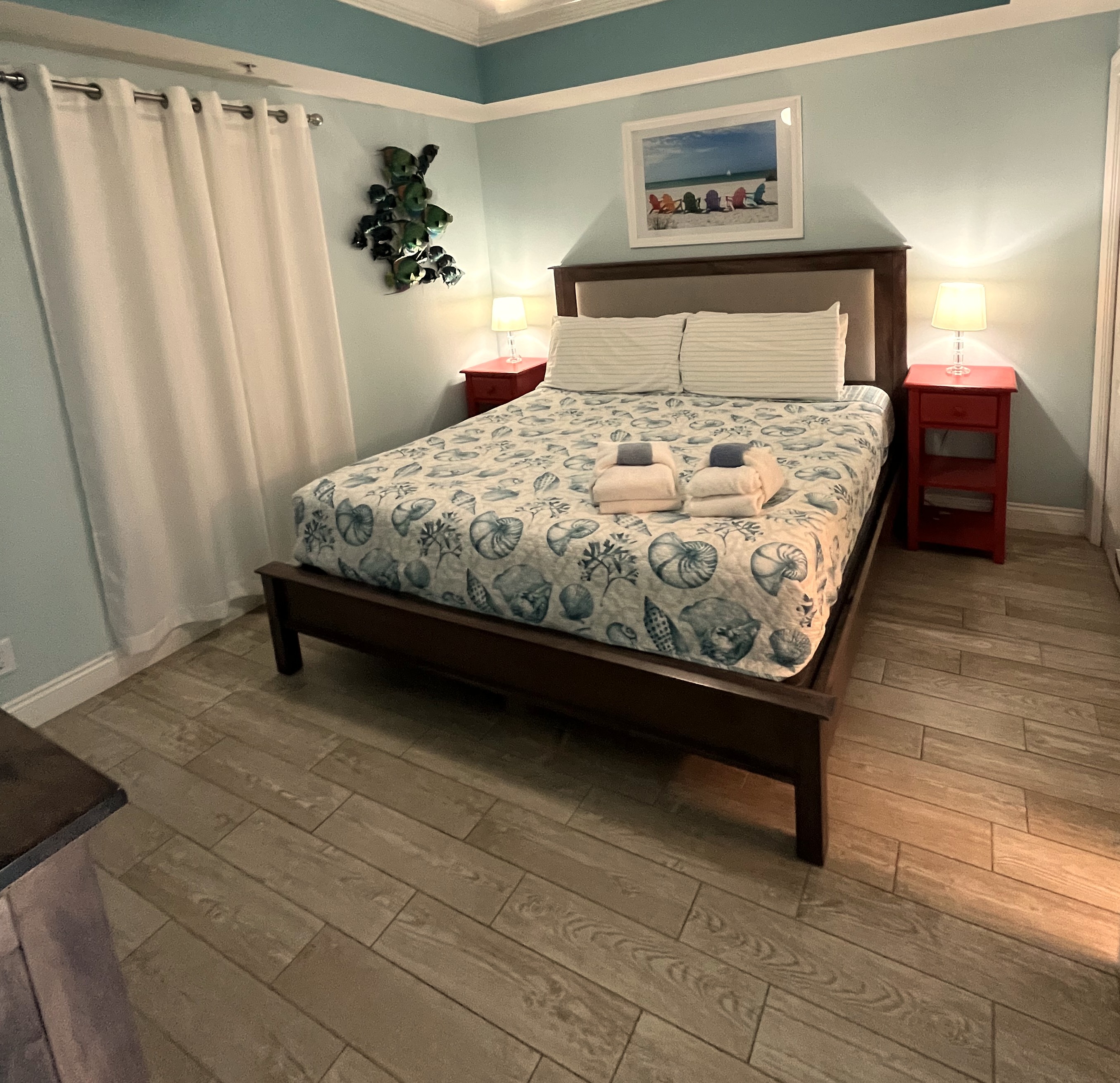 Wake up to paradise in the comfortable master bedroom.