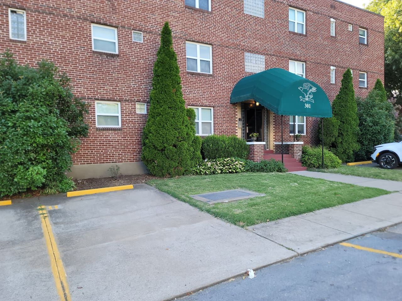 Your parking spot is #11 just next to the front door of the building.