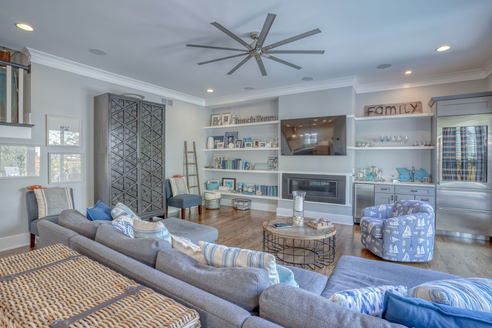 Light-filled living room perfect for movie nights or relaxing after a day at the beach