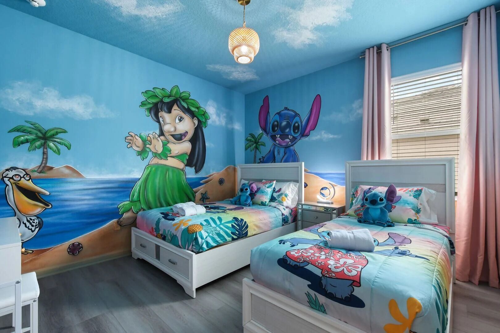 Dive into a tropical adventure with this custom Lilo & Stitch bunk room—where every night is a luau!