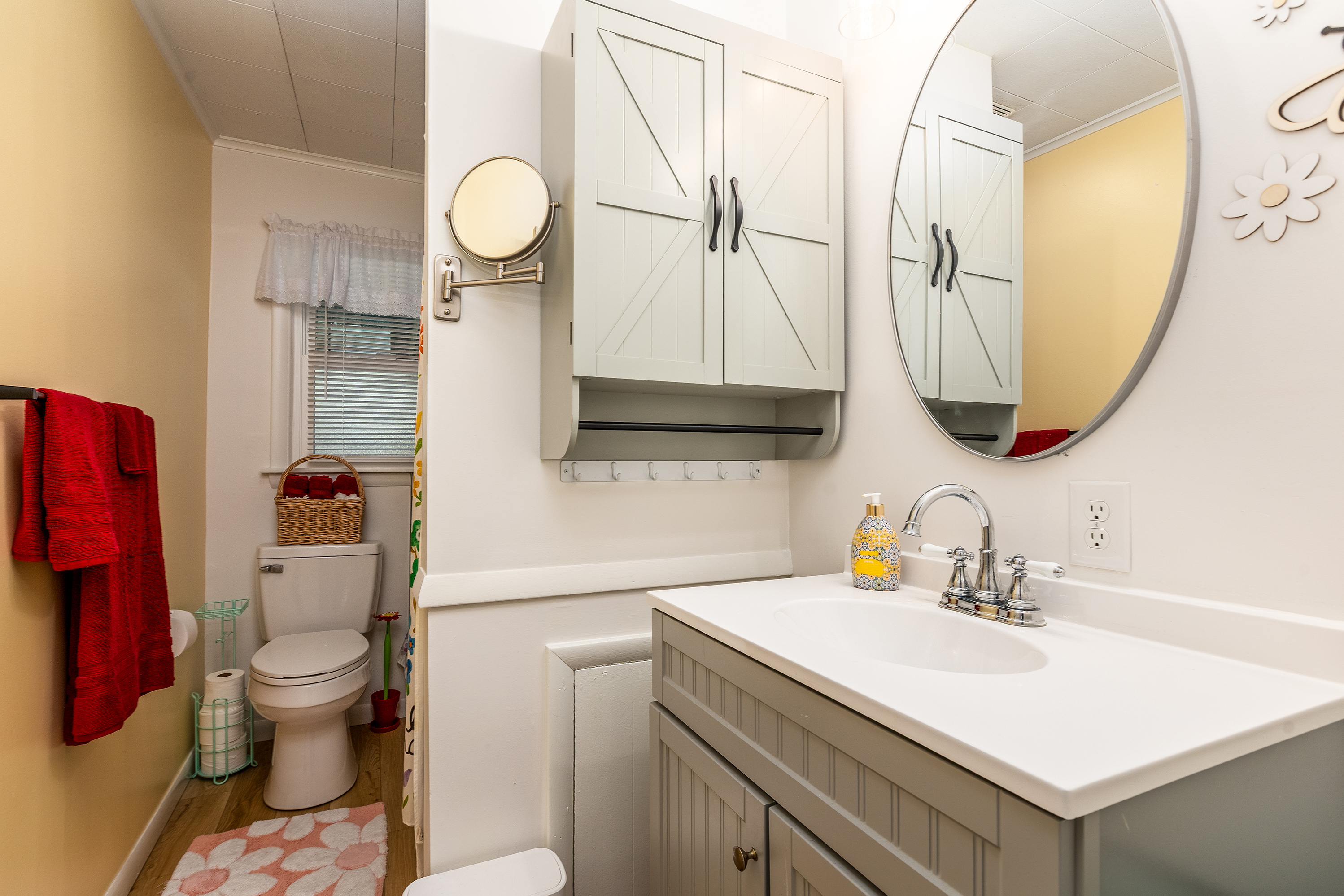 Bathroom 1: A clean, bright full bath with a shower/tub combo, vanity sink, and all the essentials for your comfort.