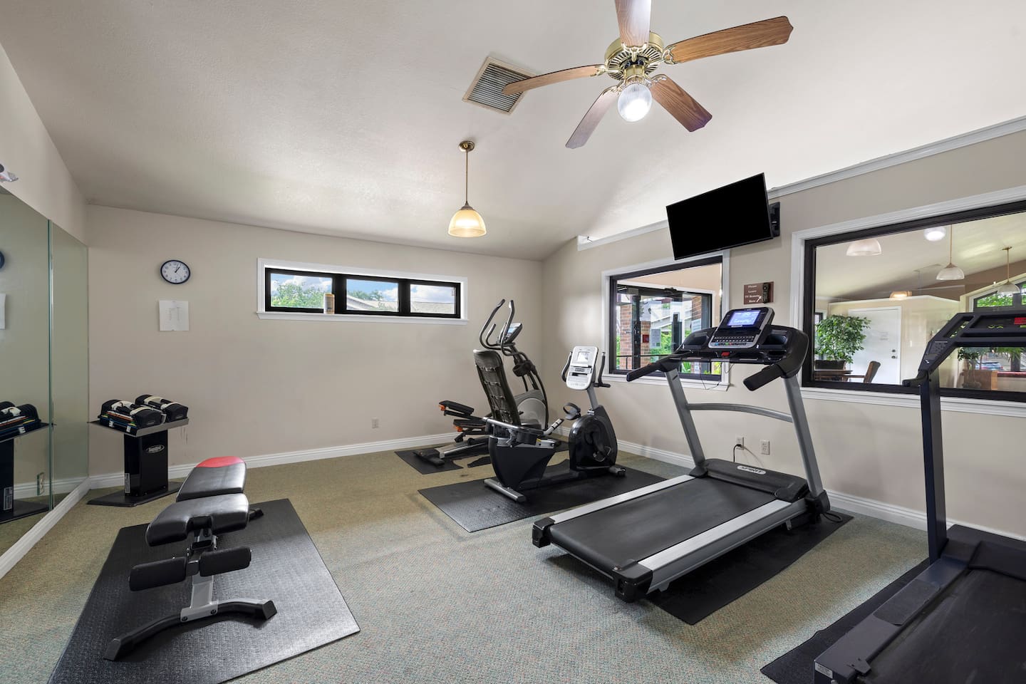 Fitness Room: Stay active with modern equipment and natural light for an energizing workout!