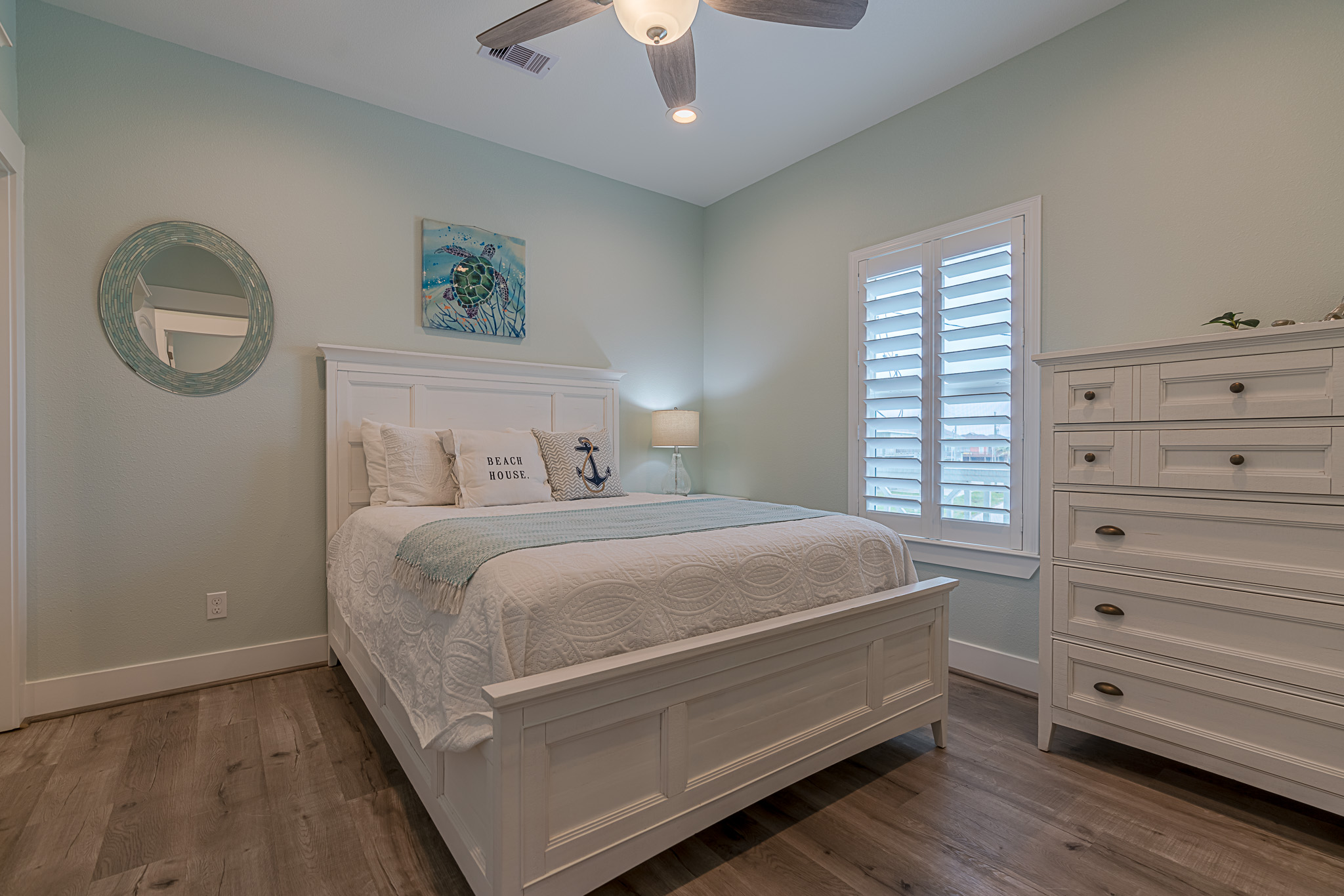 Queen bed on the main floor with a private en-suite.