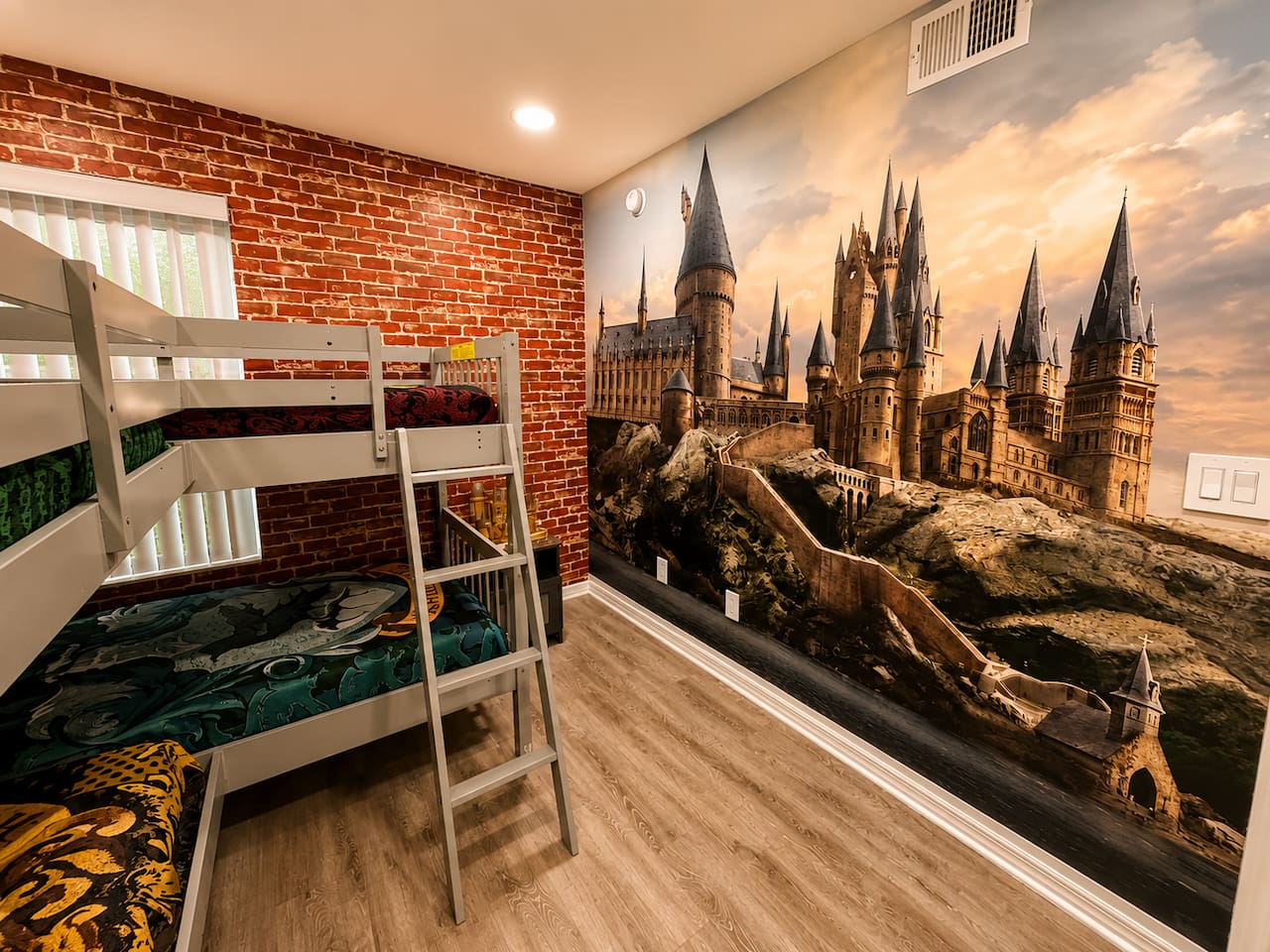 Harry Potter–themed bunk room with two twin-over-twin beds. 