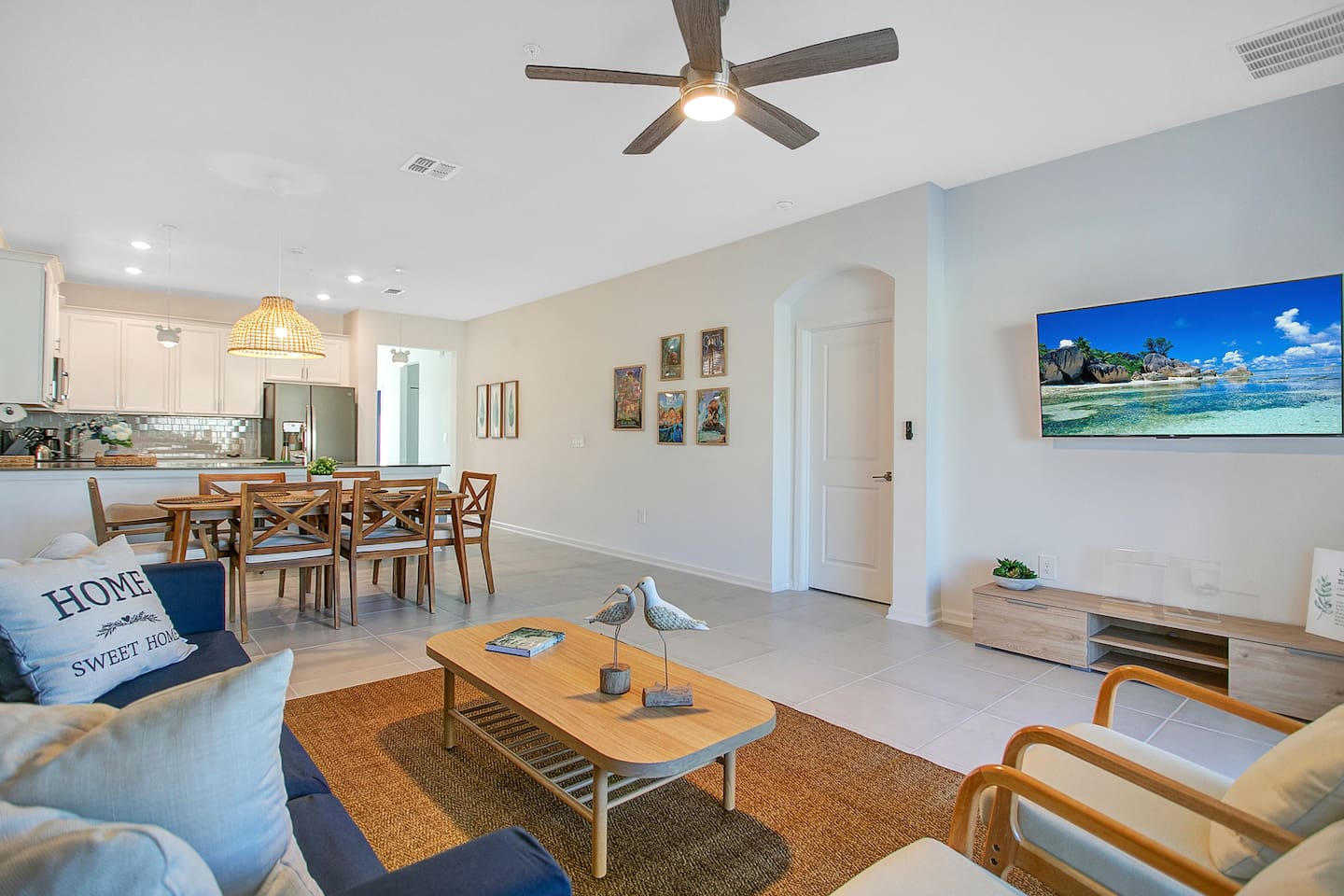 Living, dining, and kitchen space.