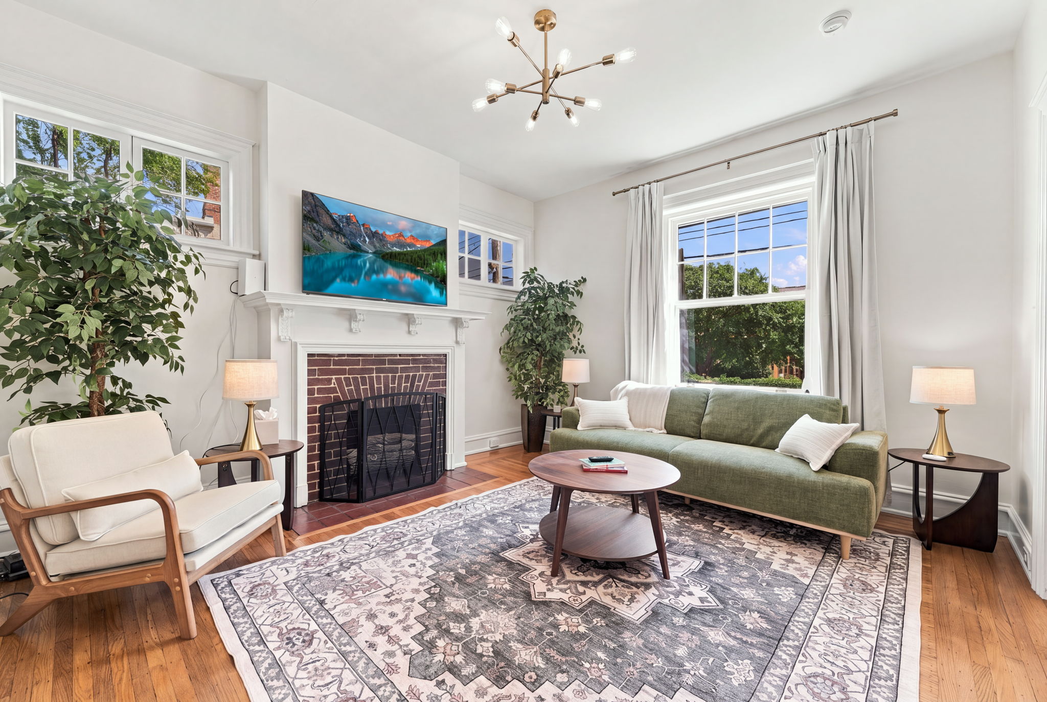 Living Room: Sunlit elegance with chic decor, perfect for relaxation or lively gatherings!
