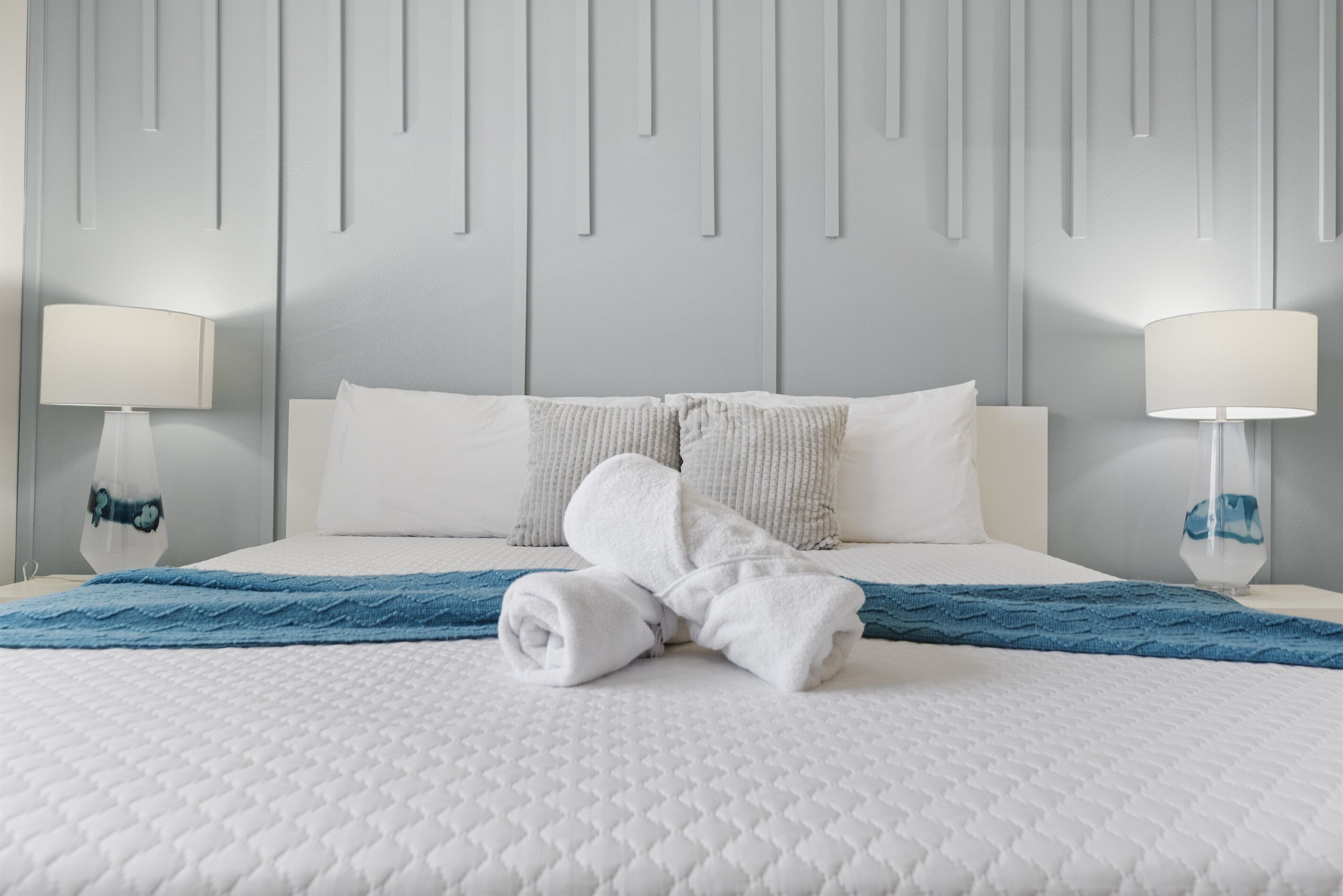 First Floor - This stunning king bedroom is perfect for families, featuring a cozy crib for your little one