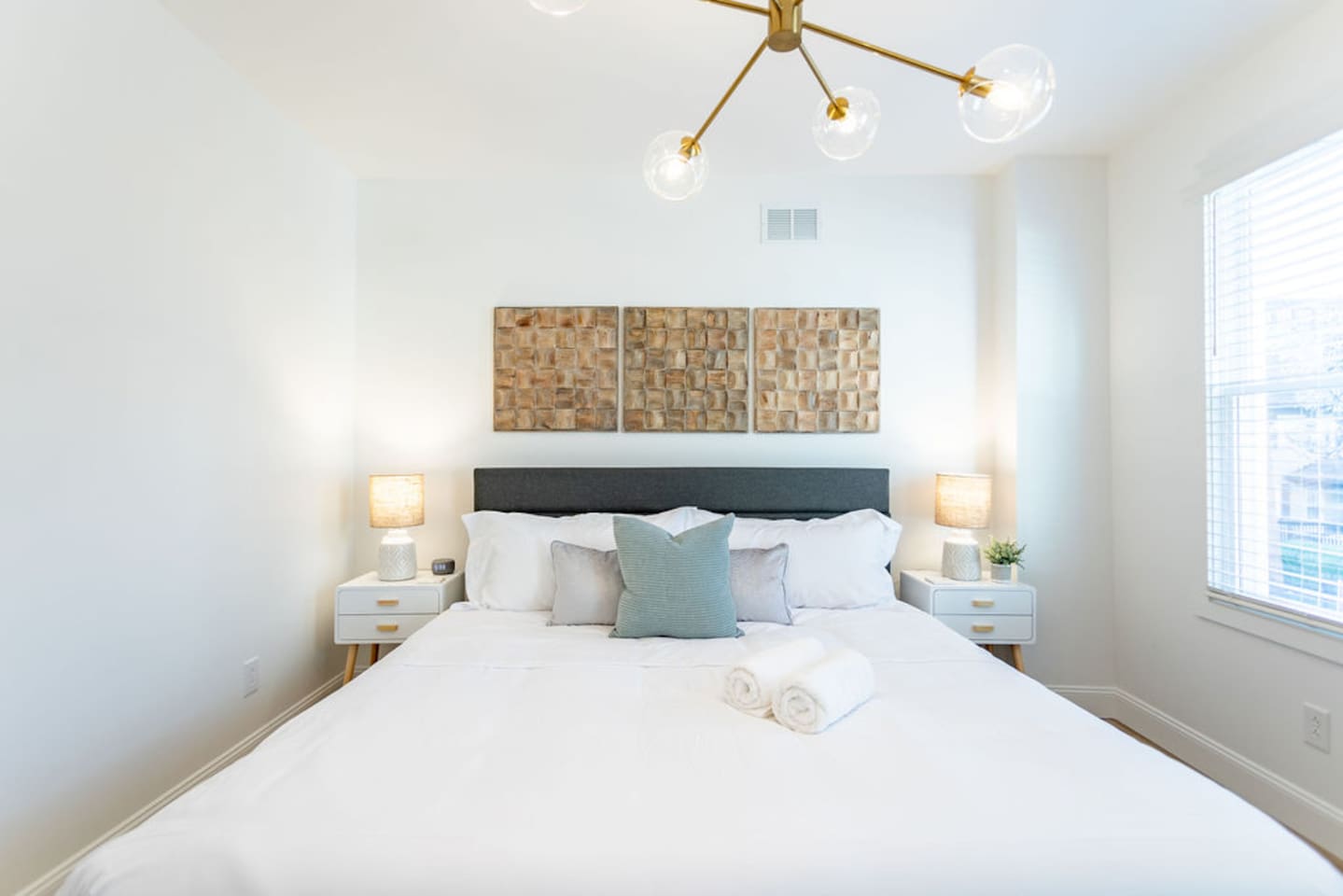 View of the spacious king-size bed, offering ultimate comfort and relaxation.