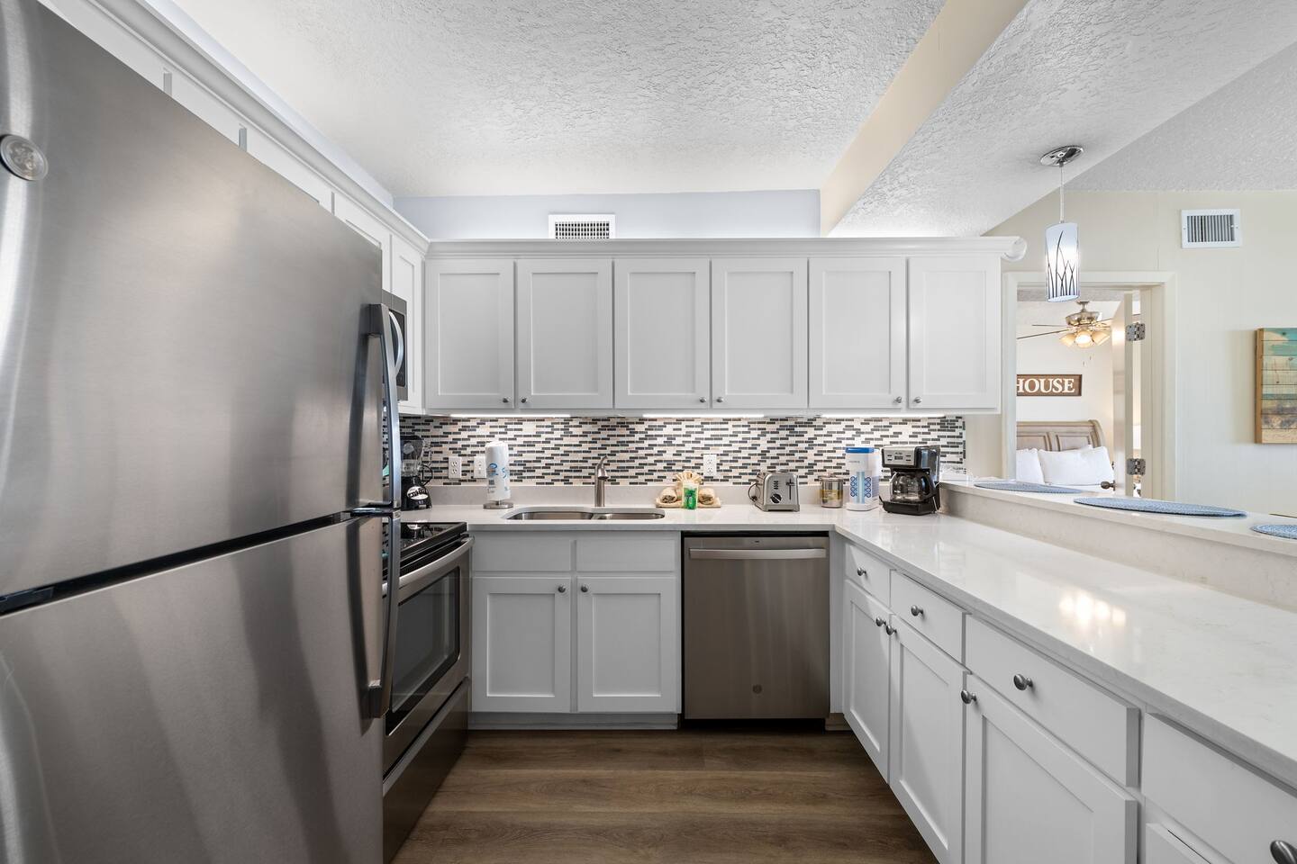 Stainless steel appliances and updated cabinets, stocked with just about everything you could possibly need.