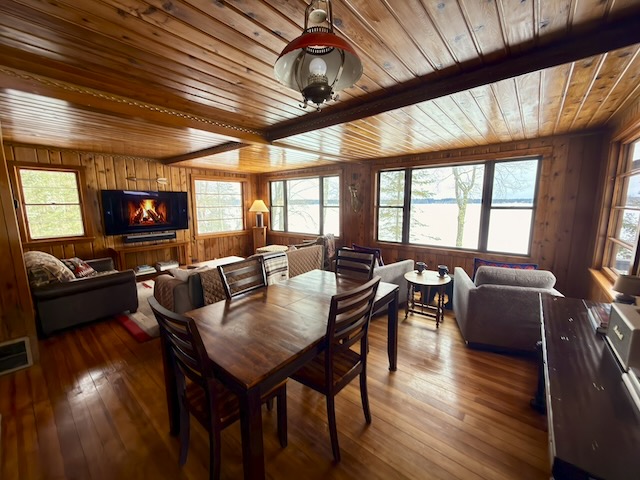 After a day of snowmobiling snuggle up un the cozy cabin and watch a movie!