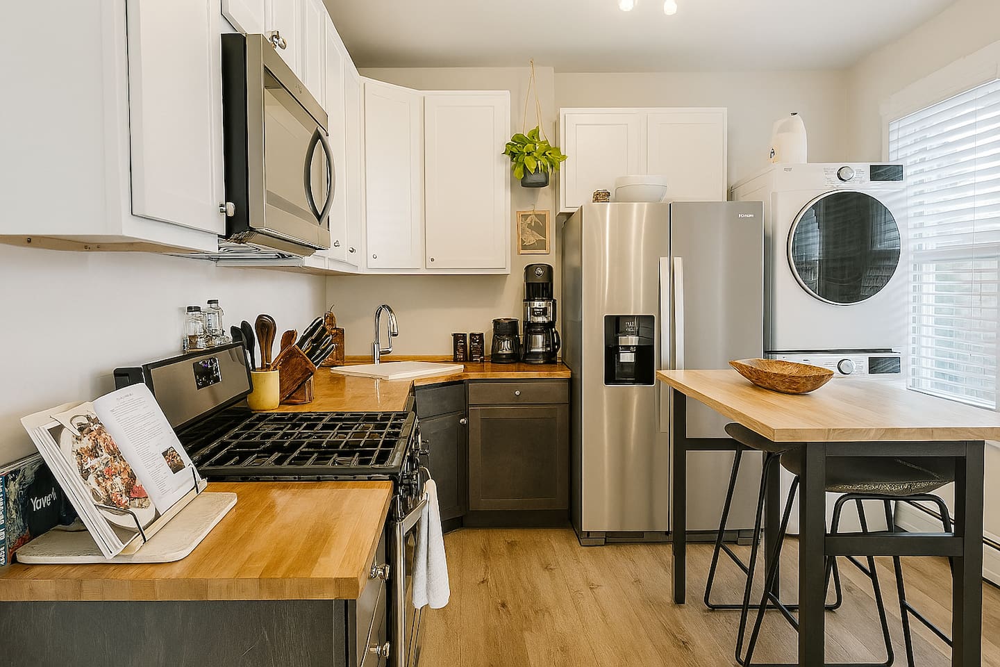 Stocked kitchen with cookware, essentials, and space to prepare meals or enjoy a relaxed breakfast.