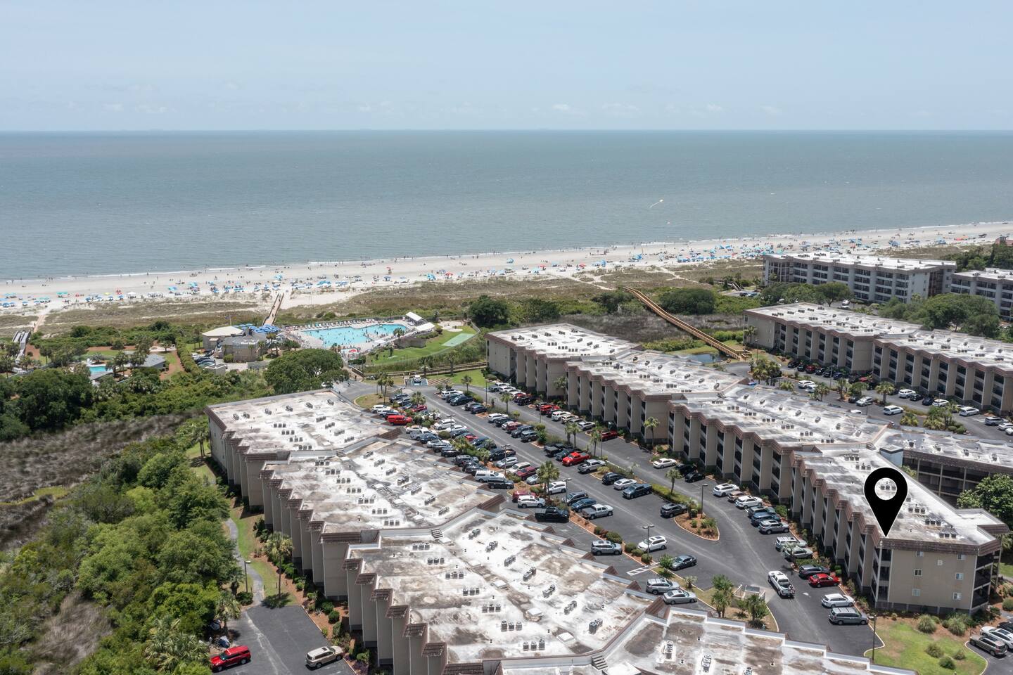 A birds eye view of the condo. 3 min. walk to the ocean!