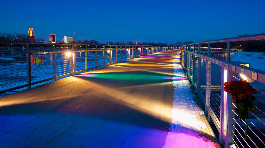 Stroll the Lauridsen pedestrian bridge lit with rainbow LEDs at night—perfect for photos and just minutes from the building.