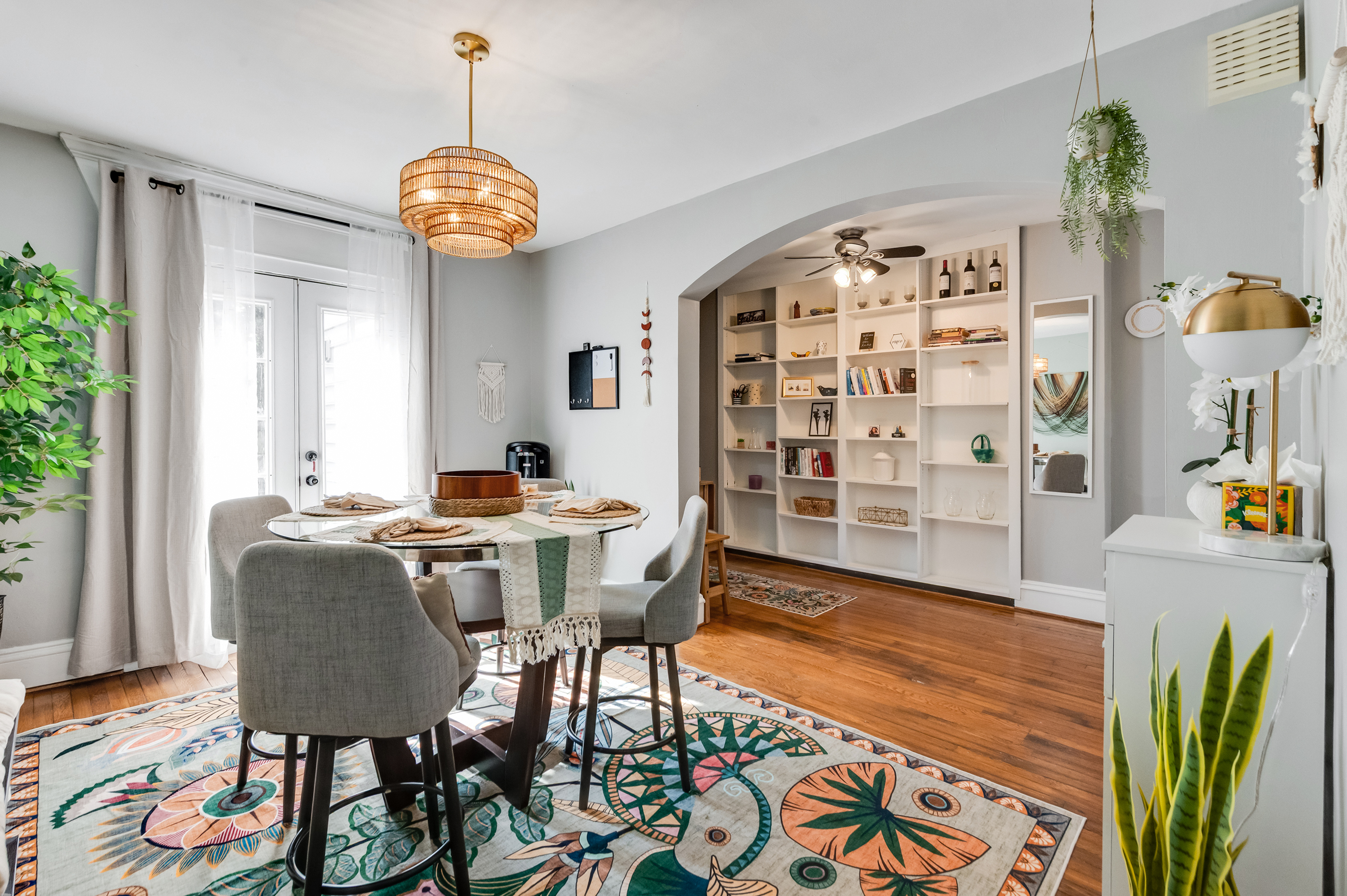 Dining Room: Enjoy delightful meals surrounded by vibrant decor and natural light!