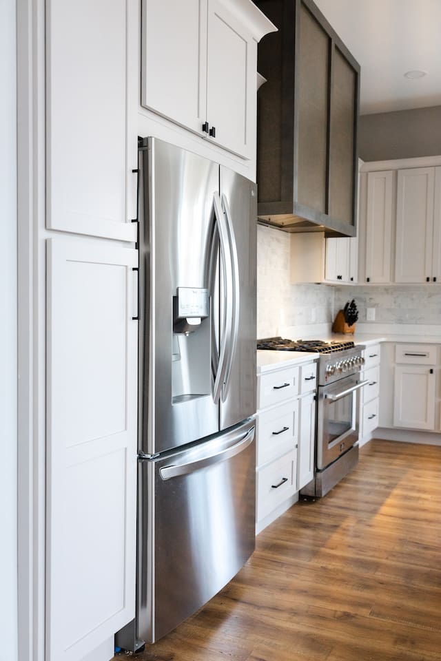 Island seats 5 with an additional two stools in the dining area. Kitchen table upgrade coming soon to accommodate even more guests. Plenty of pantry space, kitchen appliances, dishes, mugs, etc. 