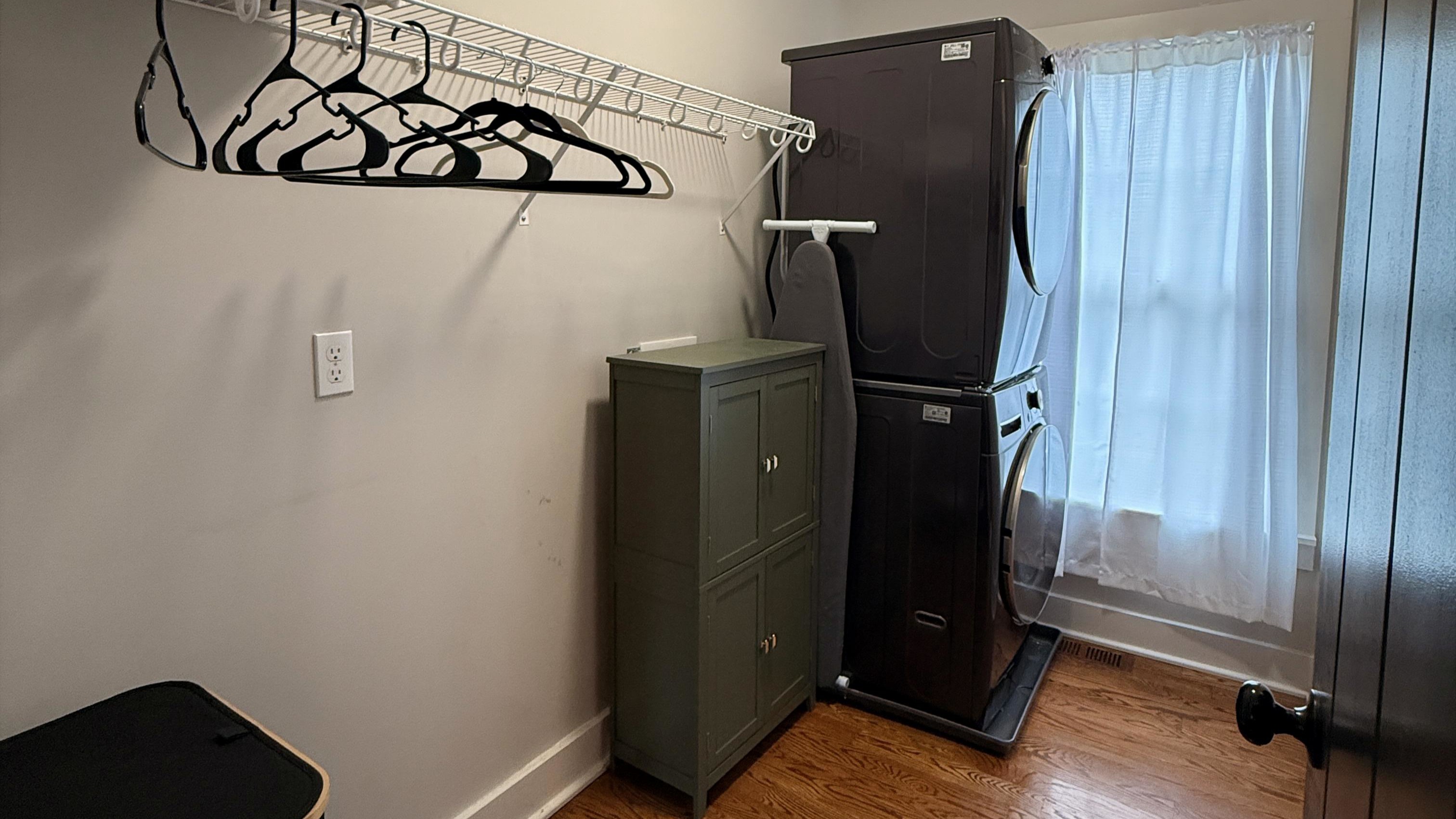 A modern luxury touch — the washer and dryer discreetly built into the primary suite’s closet blend form and function, offering effortless convenience within your private retreat.