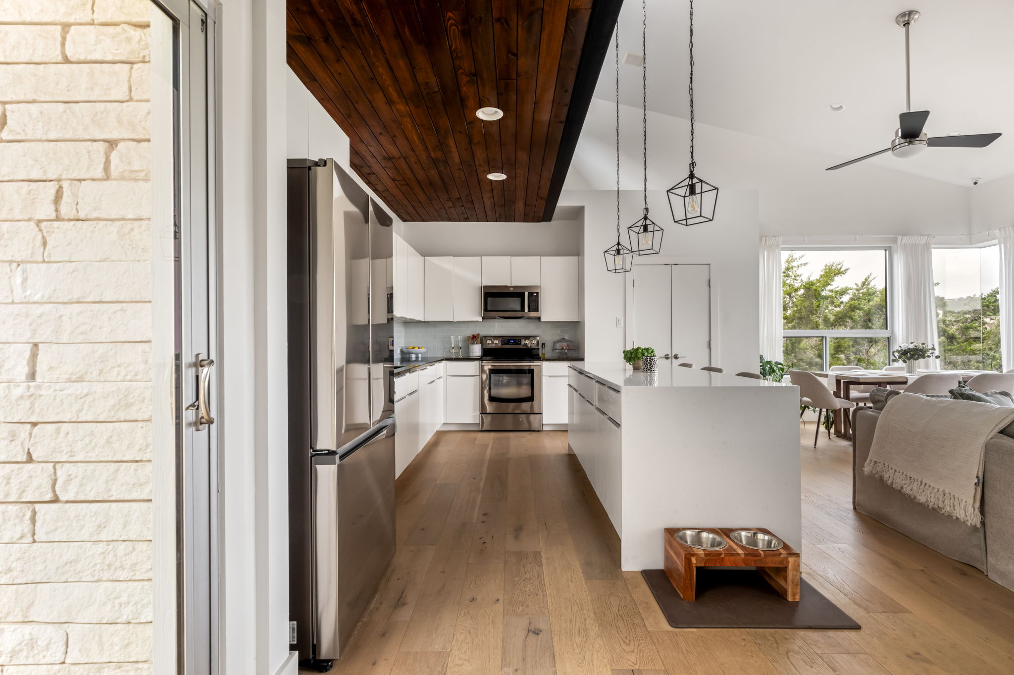 Bright, modern kitchen with a large island for meals and conversation