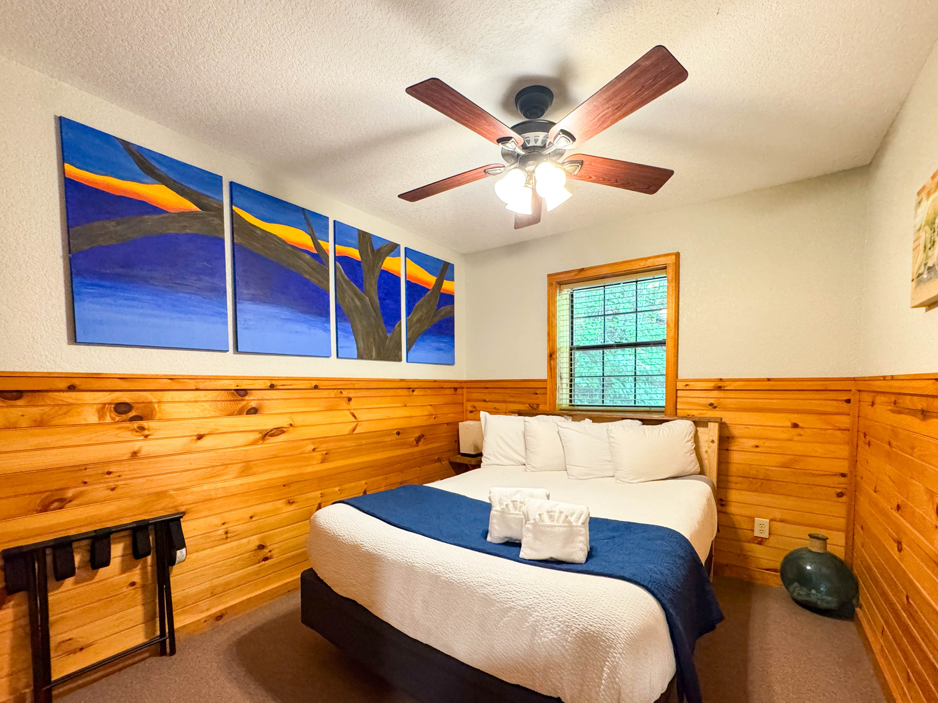 the Lower level bedroom is off the game room. It features a hybrid memory foam bed with shredded bamboo pillows. 