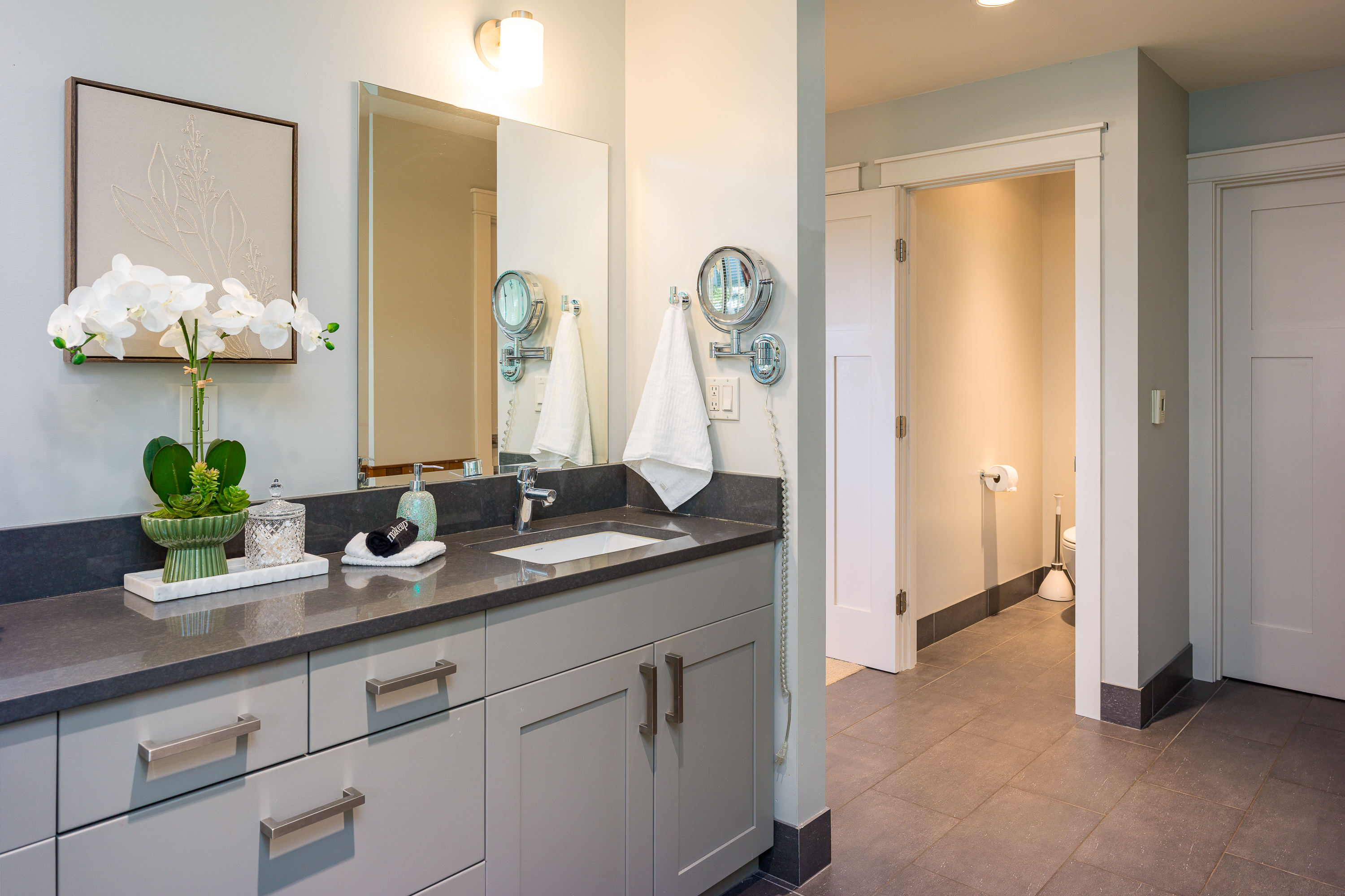 Another view of the primary bath's spa-like elegance.  Experience the full spa feel-open, luxurious and calming.