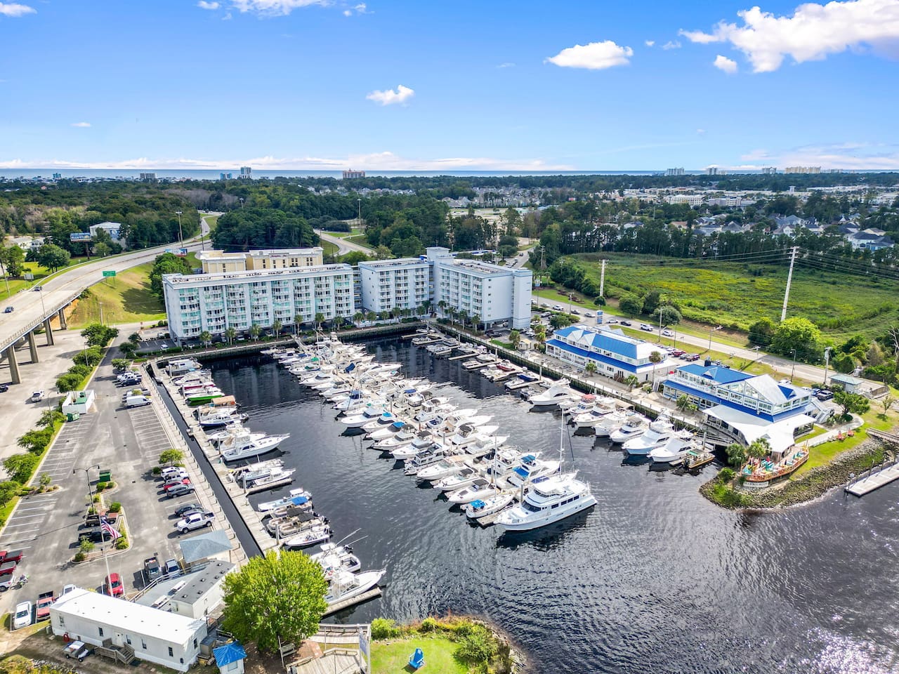Located at Harbourgate Marina—steps from boating, fishing, jet skis & waterfront dining