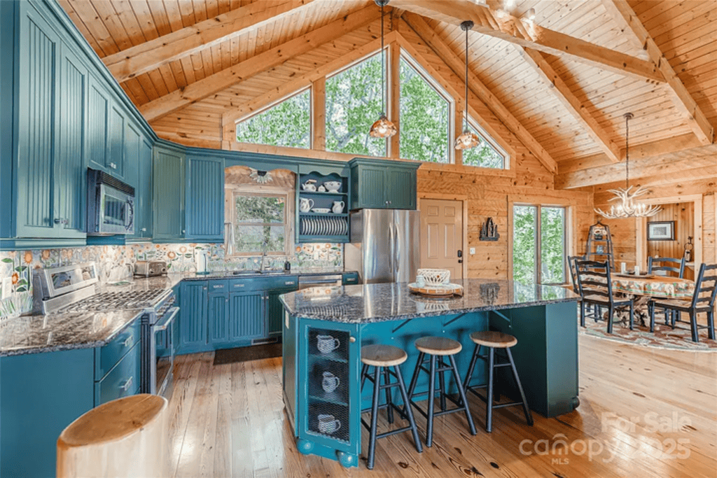 Gourmet Kitchen: Whip up culinary delights in this stunning, light-filled kitchen with mountain views!