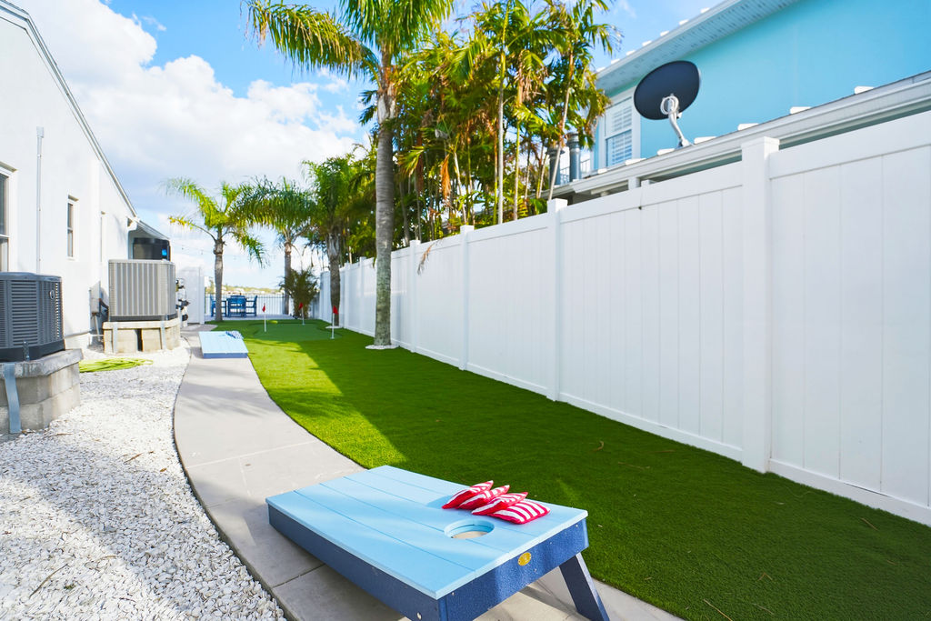 Let the games begin! This backyard hangout is the perfect spot for a round of corn hole and some friendly competition.