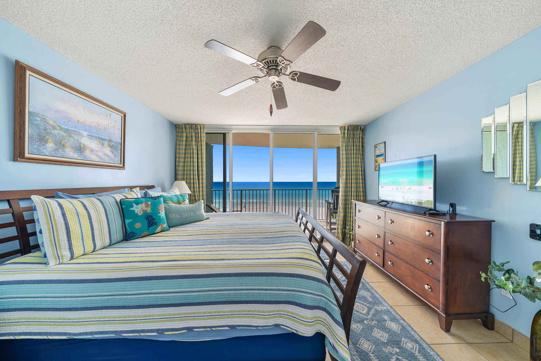Master bedroom with king size bed and ocean view