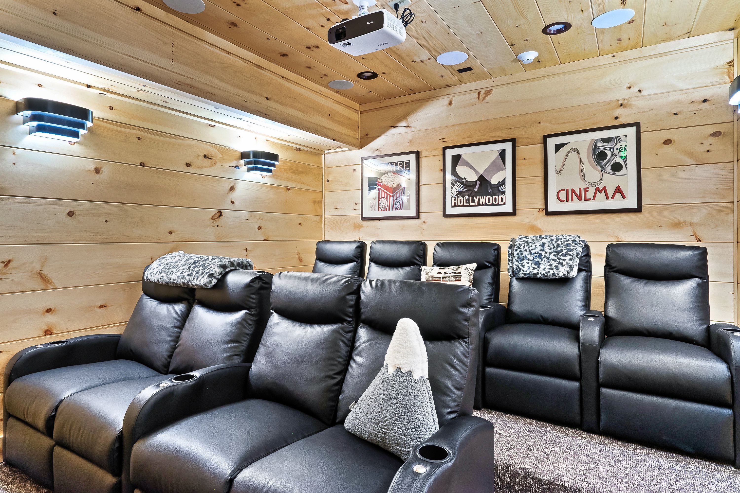 Theater room, cozy seats, soft fuzzy pillows & blankets for watching a movie or cheering on your favorite team!
