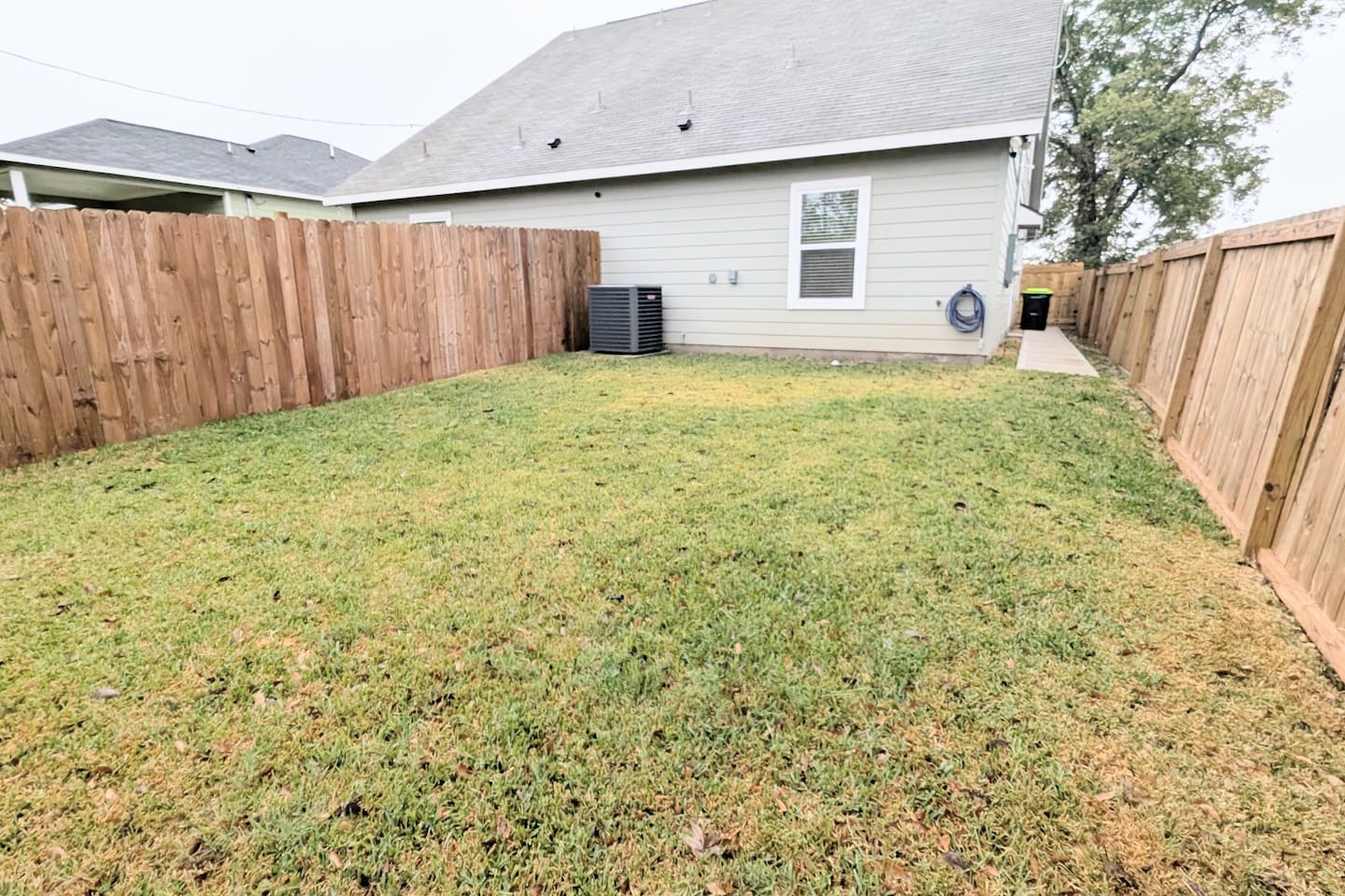 Backyard is easily accessible from the back door in the kitchen. 