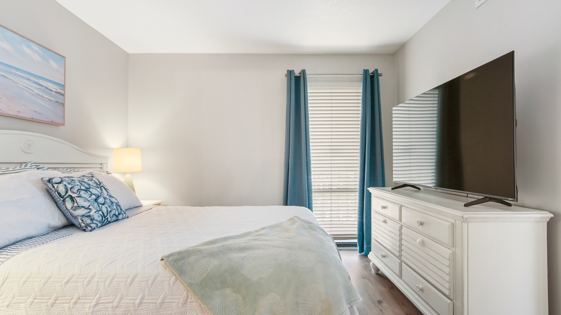 Second bedroom with queen bed, and bathroom access