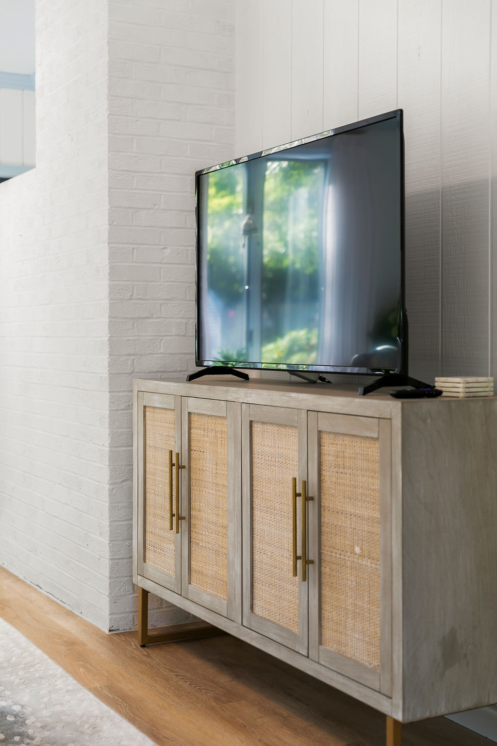 Elevate your sunroom experience with a smart TV, bringing entertainment to the heart of relaxation.
