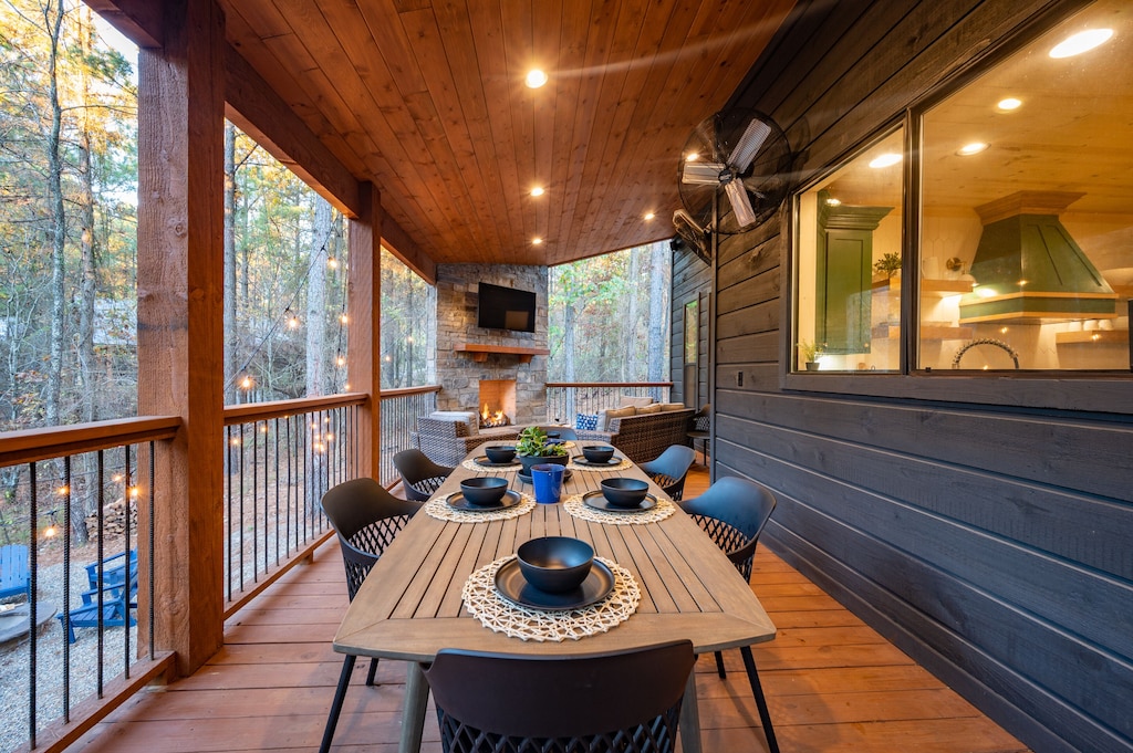 Dining Area on Back Deck with Hurricane Wall Fans For a Breeze in the Summer